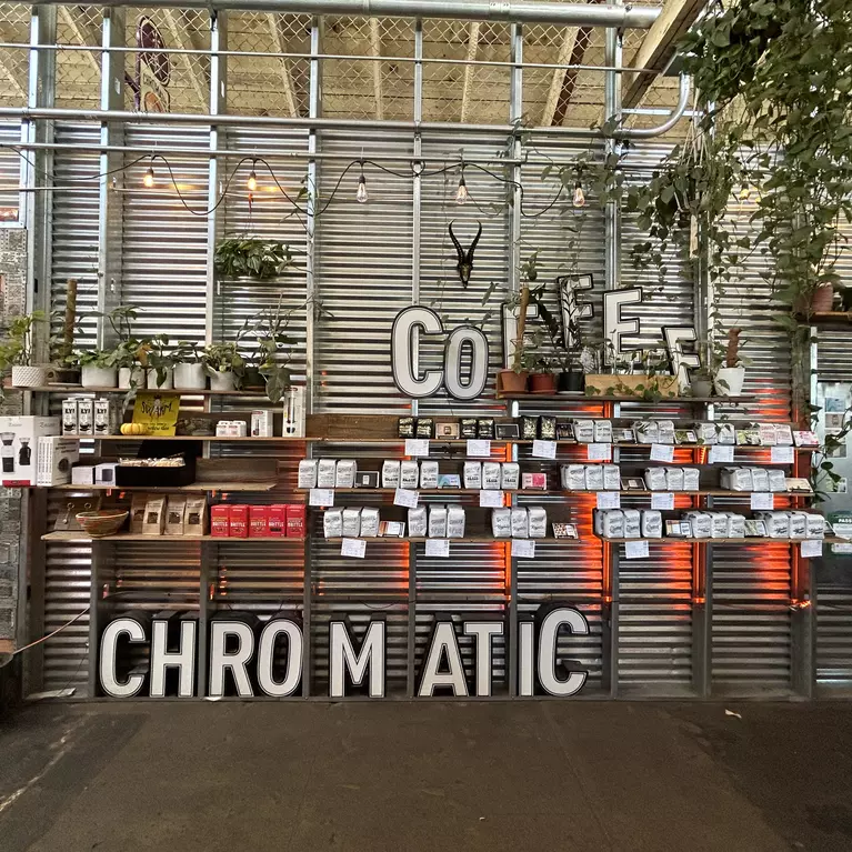 Merch stand inside Chromatic Coffee in San Jose