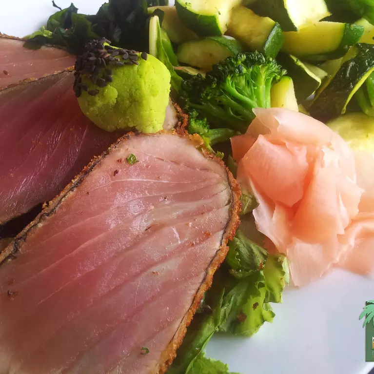 slices of meat and broccoli 